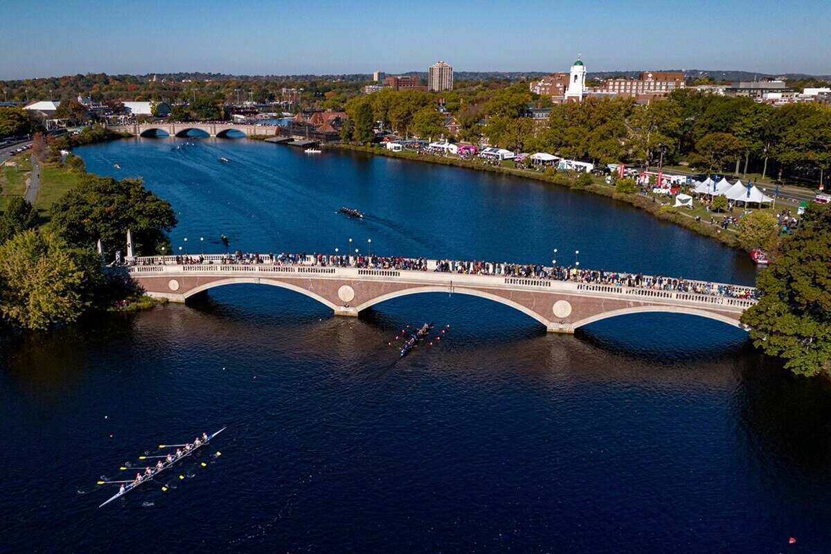 aerial view of Head of the Charles - annual Rowing Contest on Charles River at Harvard in front of Weeks Bridge