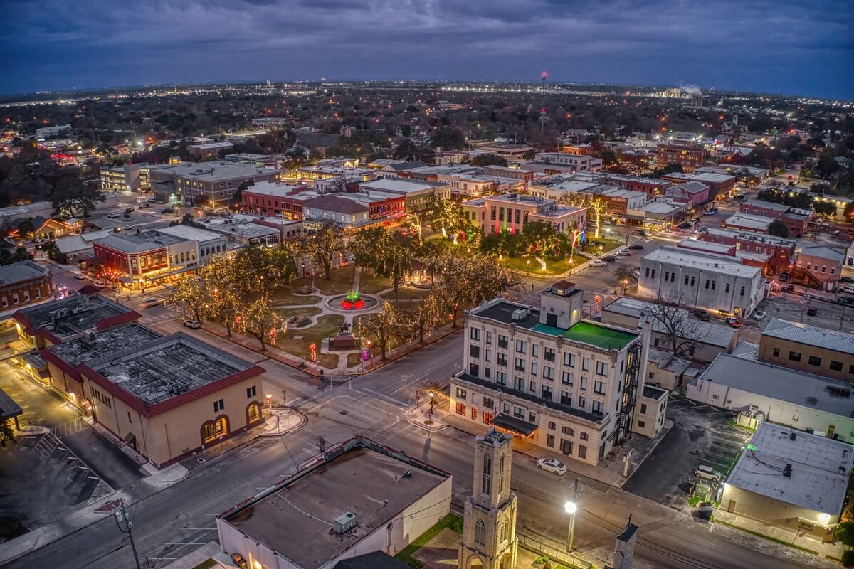aerial view of Seguin Texas at dusk during the winter holiday season
