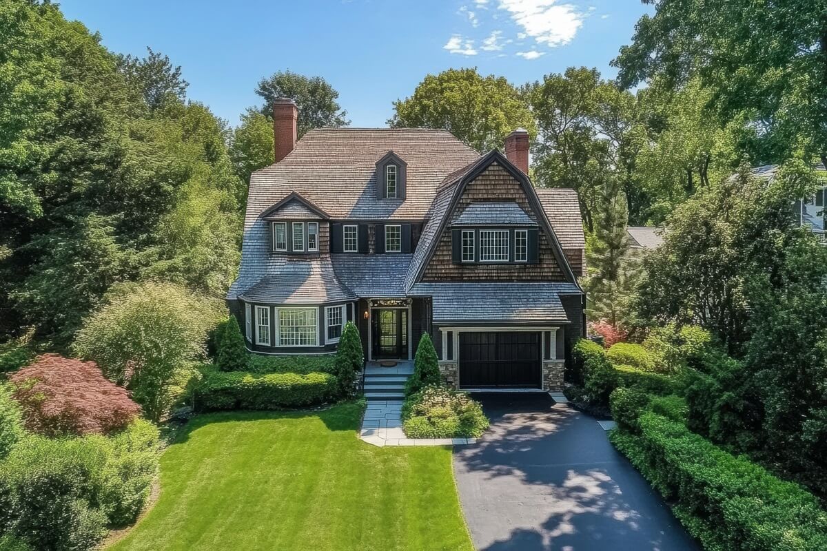 beautiful family home with shingle siding and multiple gables in Brighton Massachusetts