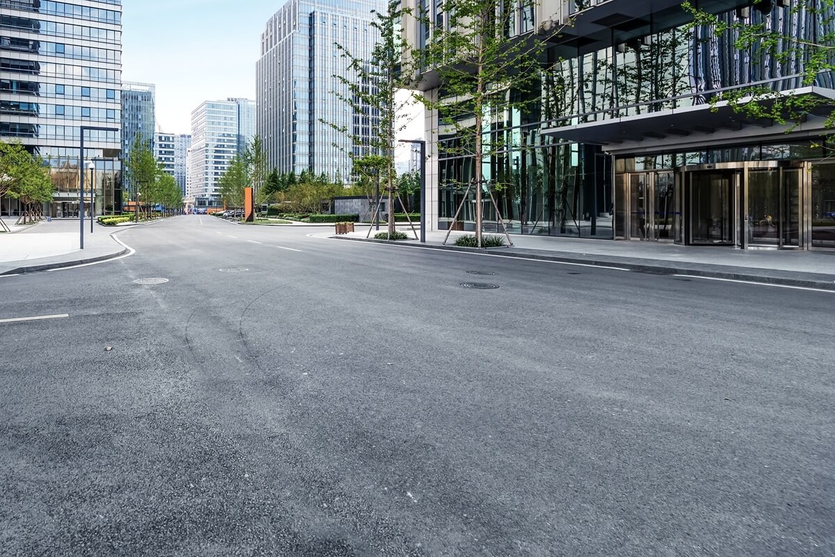 empty highway with cityscape and skyline