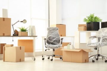 moving boxes and furniture in new office