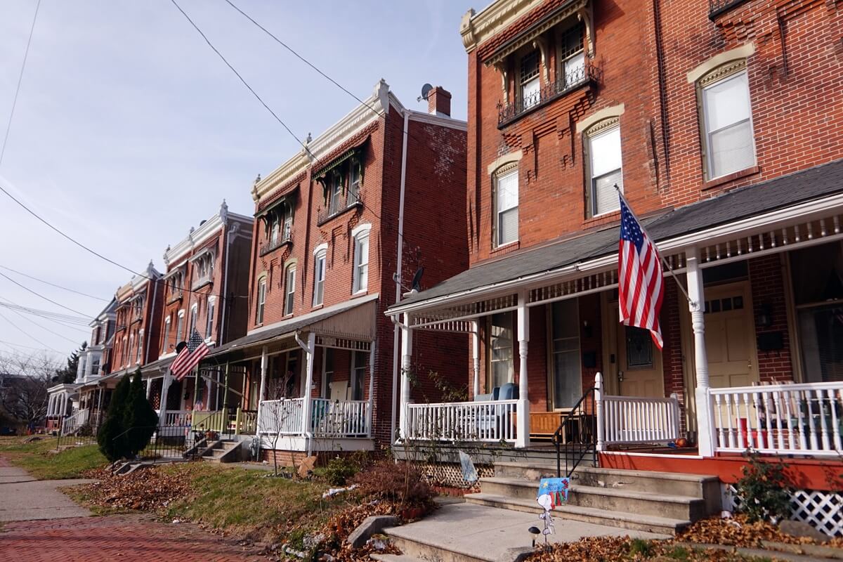 old brick twin home on winter day landscape Norristown Pennsylvania