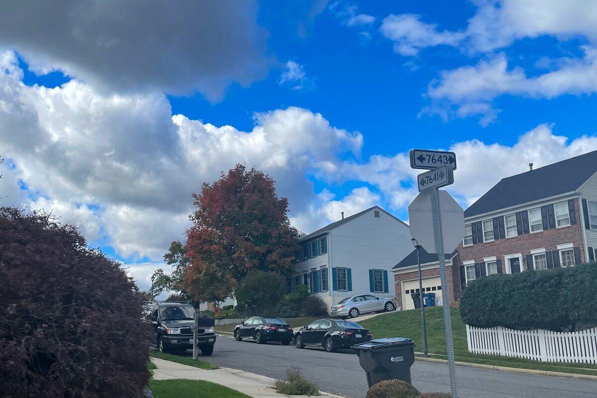 suburban homes surrounded by trees changing colors Lorton Virginia USA
